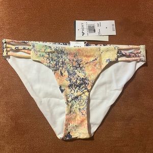 New never worn Roxy swimsuit bottoms. White, blue and orange color.